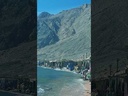 Camels walking on the three pools beach in Dahab, South Sinai Egypt.