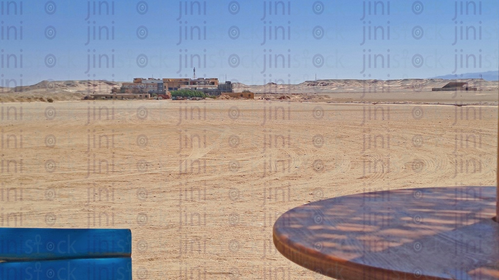 Mountains ,sands in the desert of the red sea and a table for putting products on it