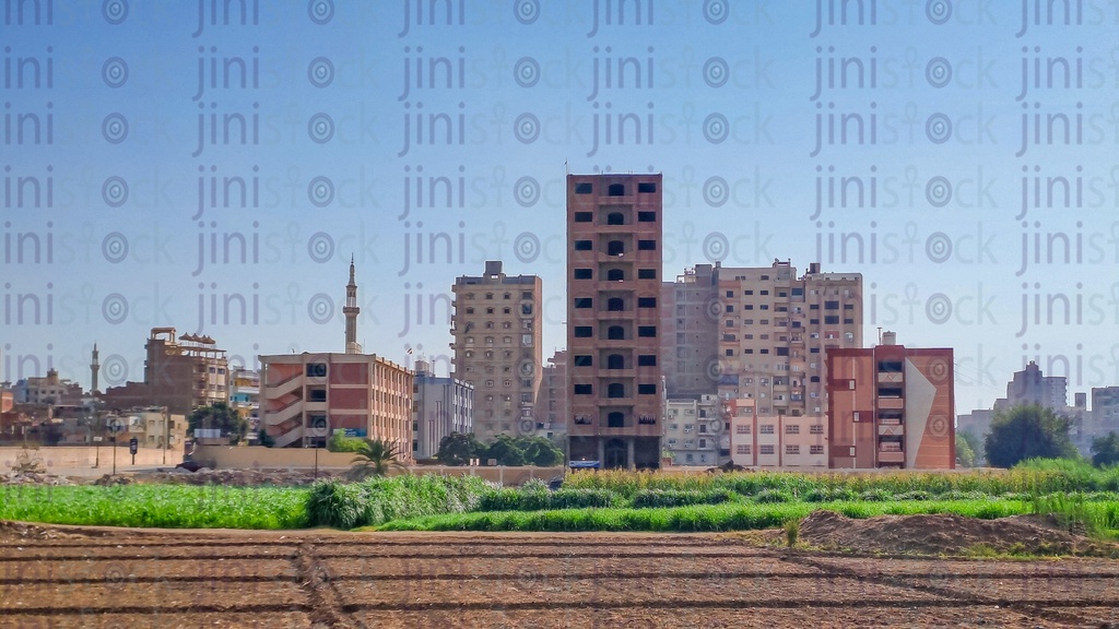 An agriculture land and the buildings in the Egyptian countryside