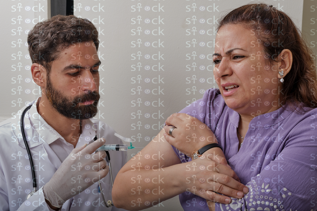 Patient receiving arm injection