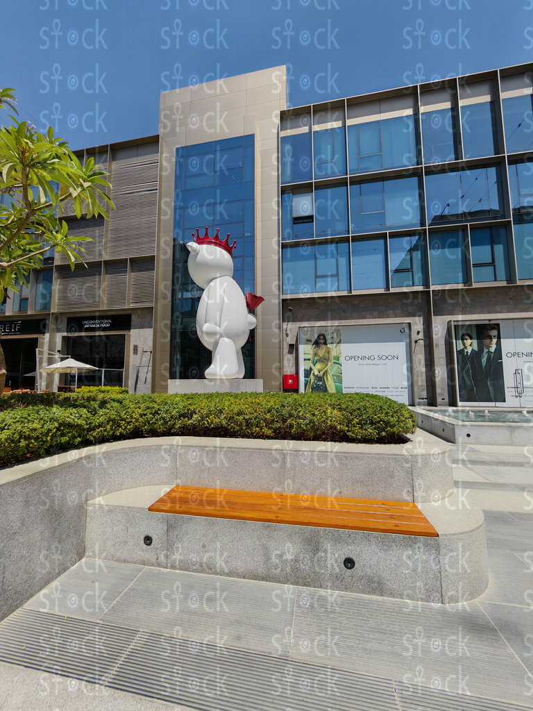 Mall entrance with greenery