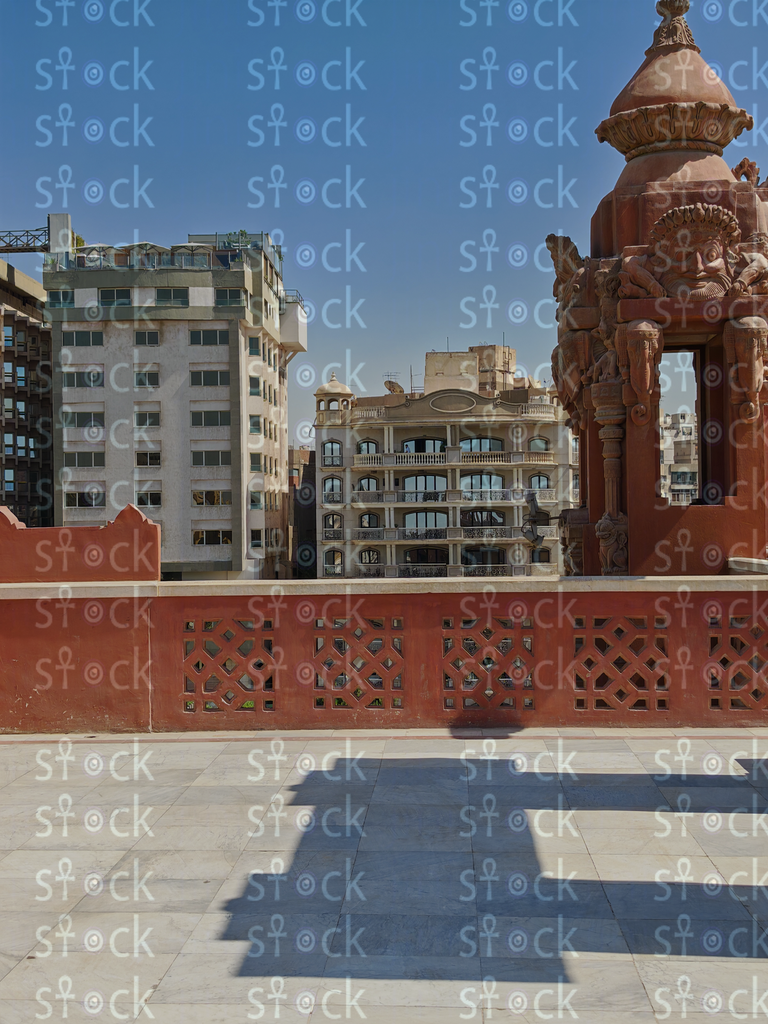 Rooftop statues overlooking city