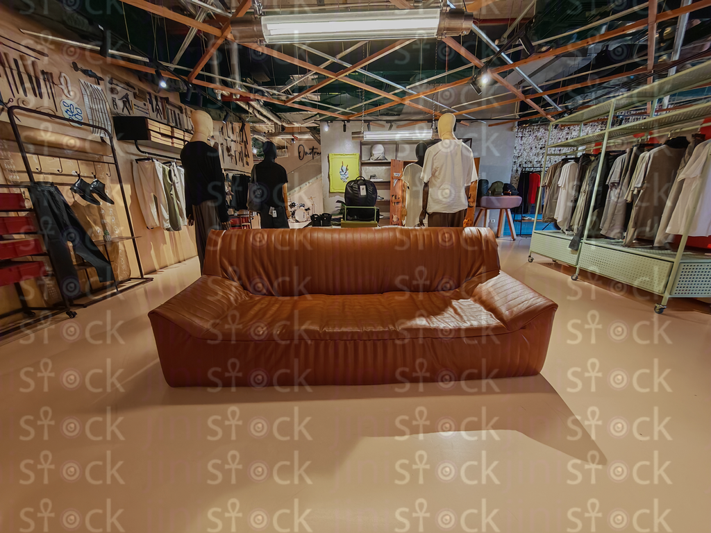 The leather sofa as the store's centerpiece