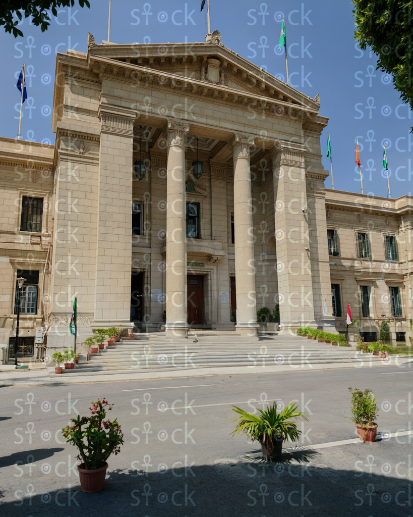 A play of light and shadow on the building's classical facade
