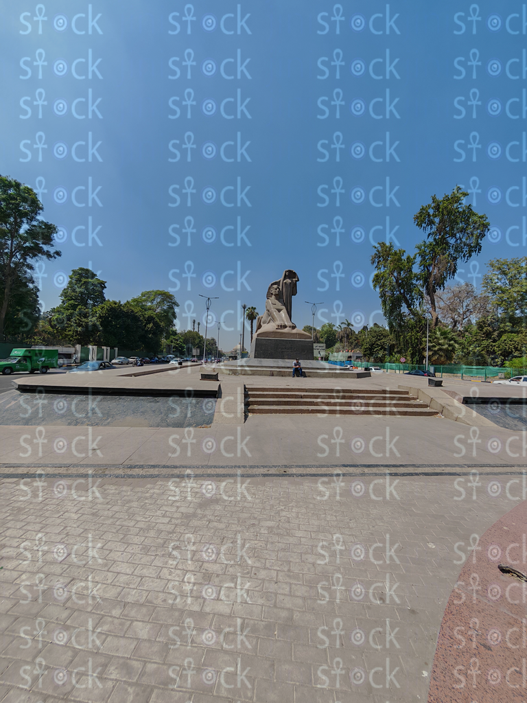 A wide-angle shot of Egypt's Renaissance Statue from the stairs