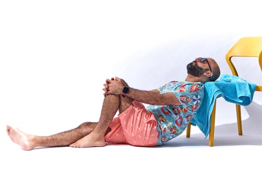 man relaxing on the beach.