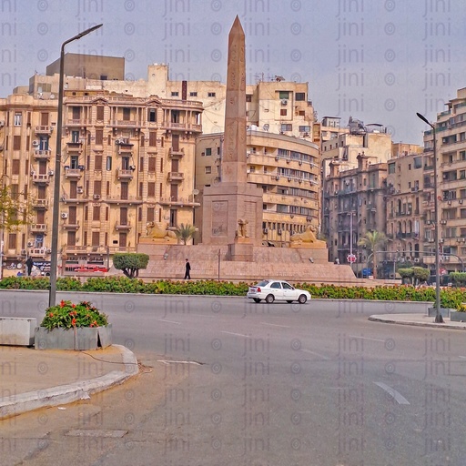 The obelisk,and Rams in Tahrir Square, Cairo, Egypt, and the Street were empty of cars, and are used as a background for designs on Cairo streets