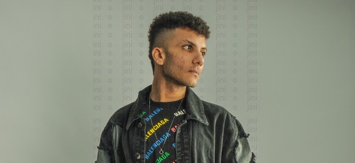 A man with pimples on his face.