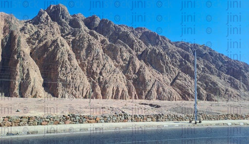 Sinai mountains in South Sinai in Egypt and a part of road with no cars or buses