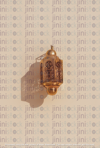 lantern in gold and coloured glasses on a wall