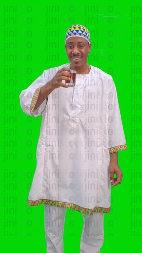 An Egyptian Nubian man wearing Nubian clothes and drinking tea.