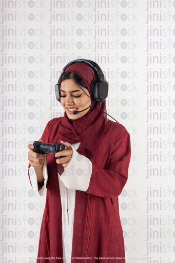 a stock image of a khaliji saudi girl with red dress online gaming