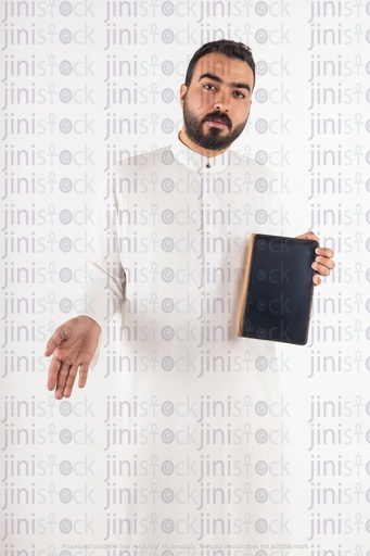 a stock image on isolated background of a khaliji saudi man from gulf with tablet
