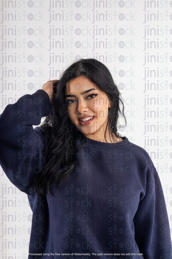 arabian woman stock image with hands in her beautiful hair on isolated background