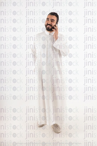 a gulf business man from saudi khaliji talking on mobile on isolated background stock image with high quality