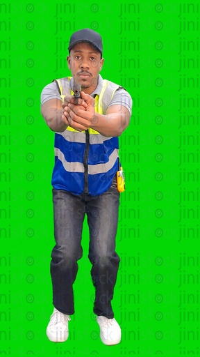 Security man wearing his work uniform, holding a gun in his hand, and walking