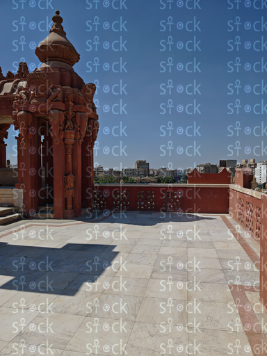 Palace rooftop with carved railing 
