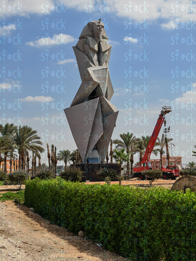 Statue surrounded by flowers