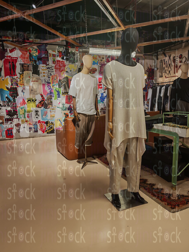  Mannequins in front of an art posters wall
