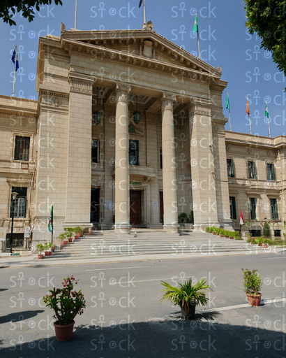 A play of light and shadow on the building's classical facade