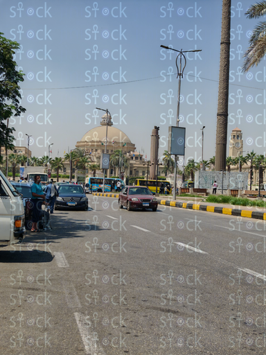 The dome of Cairo University stands out in the streets of Giza